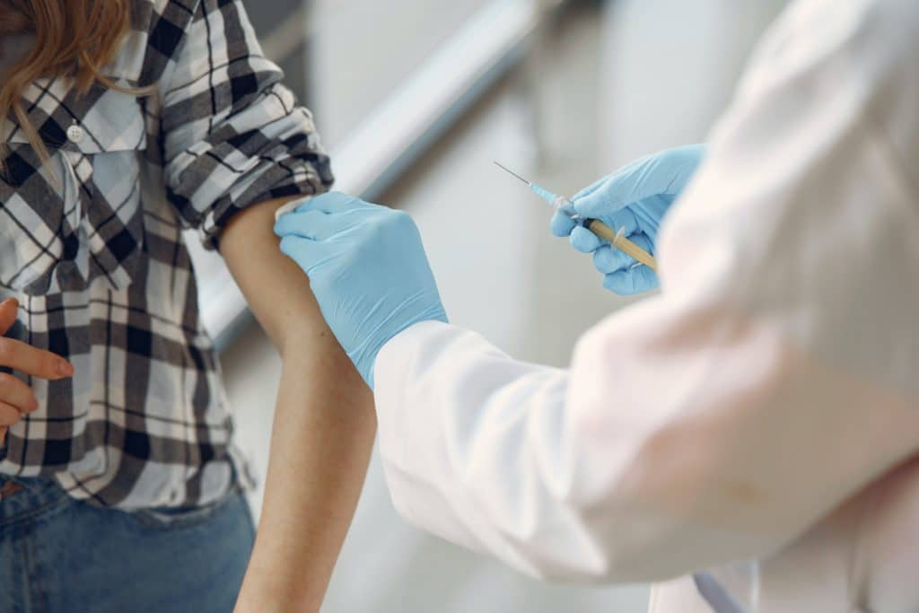 nurse giving a vaccination